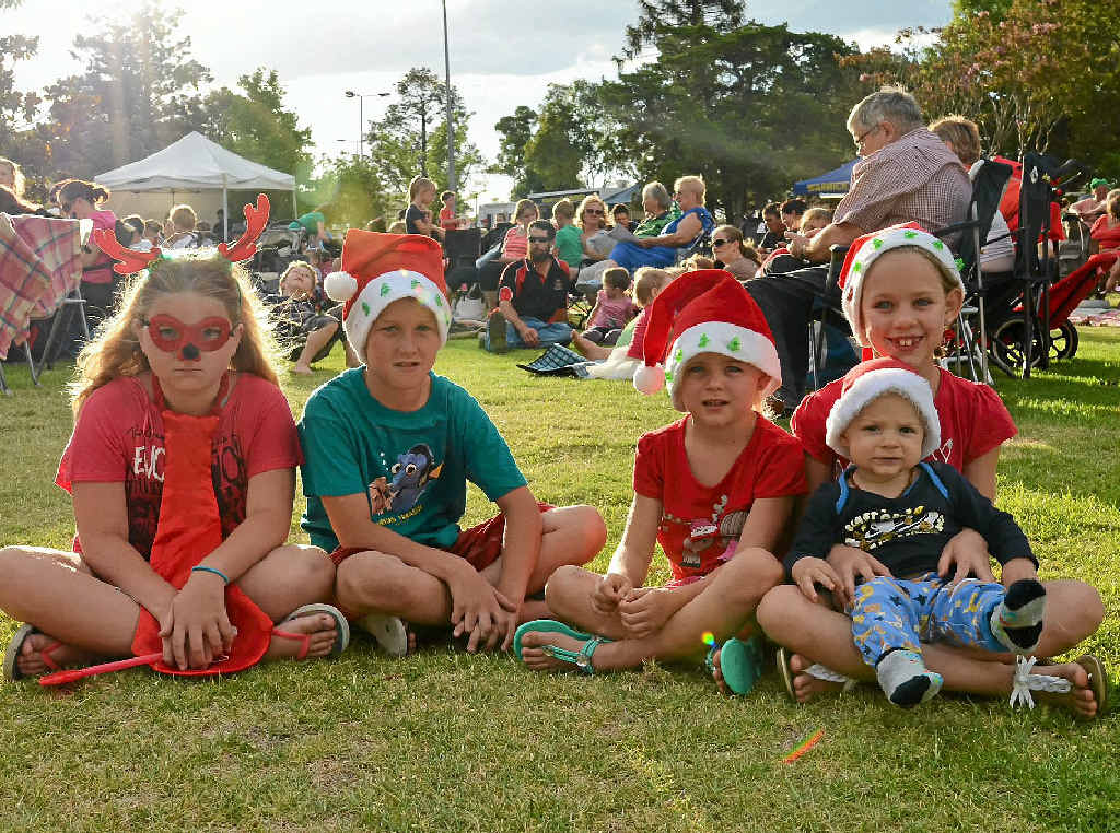 CHRISTMAS MUSIC: Shyann Ezzy, Blake Ezzy, Felicity Isobelle McConville, Taitum McConville and Levi Bryce enjoy the Carols in the Park on Sunday. CHRISTMAS MUSIC: Shyann Ezzy, Blake Ezzy, Felicity Isobelle McConville, Taitum McConville and Levi Bryce enjoy the Carols in the Park on Sunday.